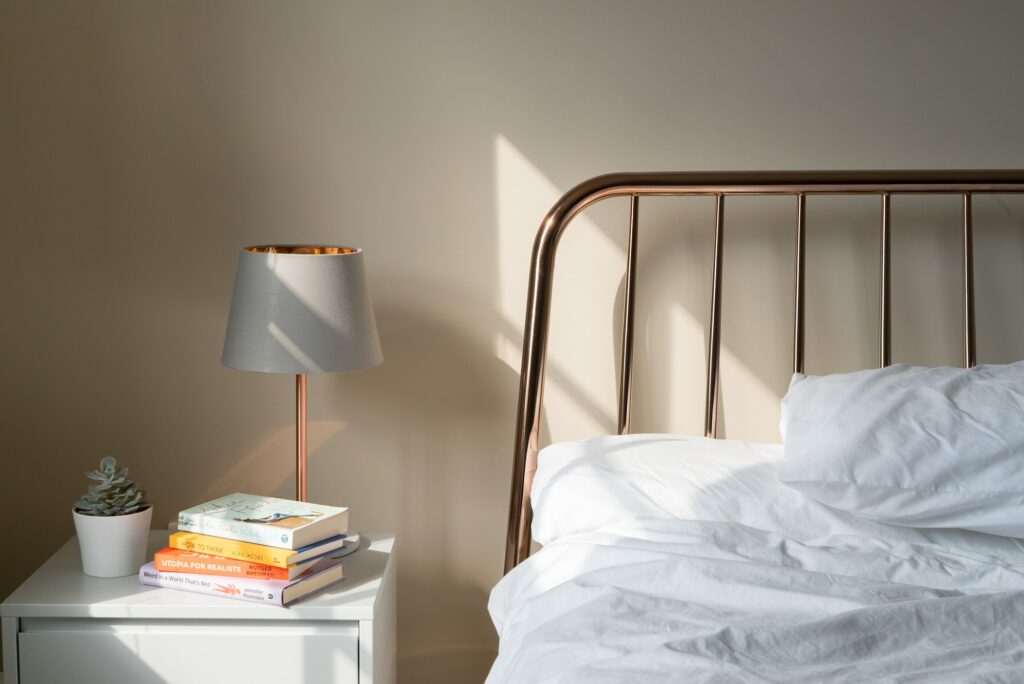 cozy-bed-frame-and-bed-side-table-with-standing-lamp